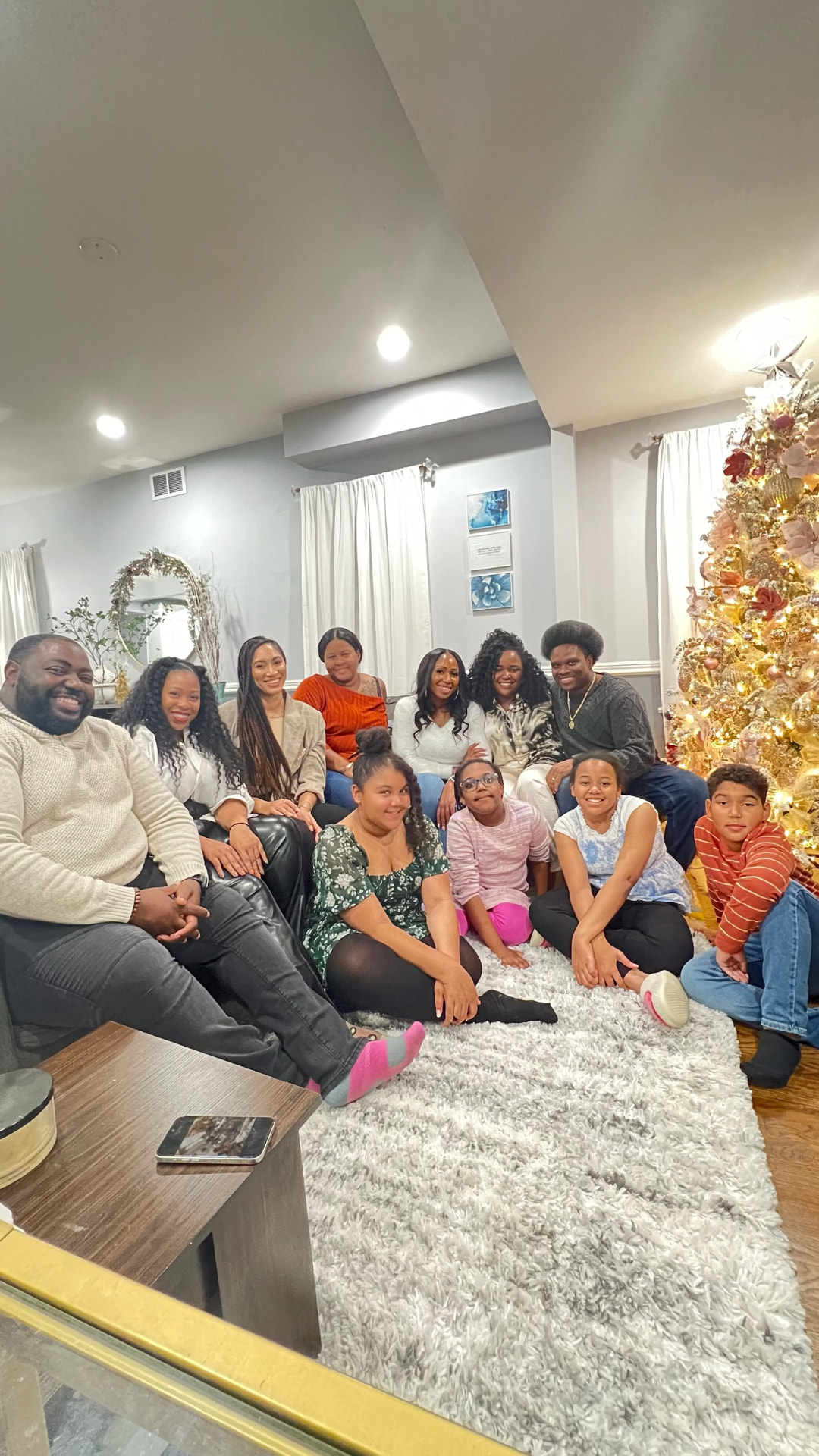 FriendsMas group photo by the Christmas tree